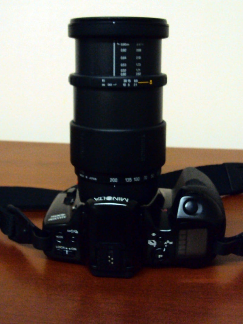 Minolta Maxxum 400si 35mm SLR Film Camera with Lens Built-in Flash (Renewed) - Image 1